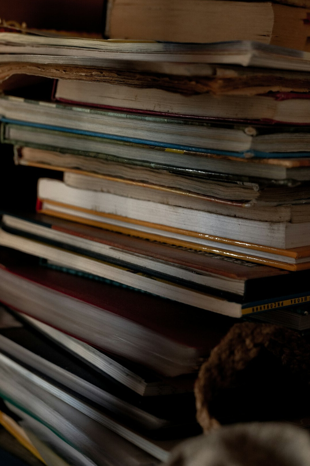 Stack of old books and papers for historical research