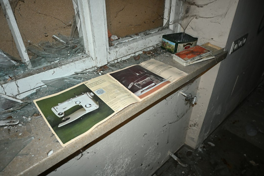 Archive folders and paper documents on a table